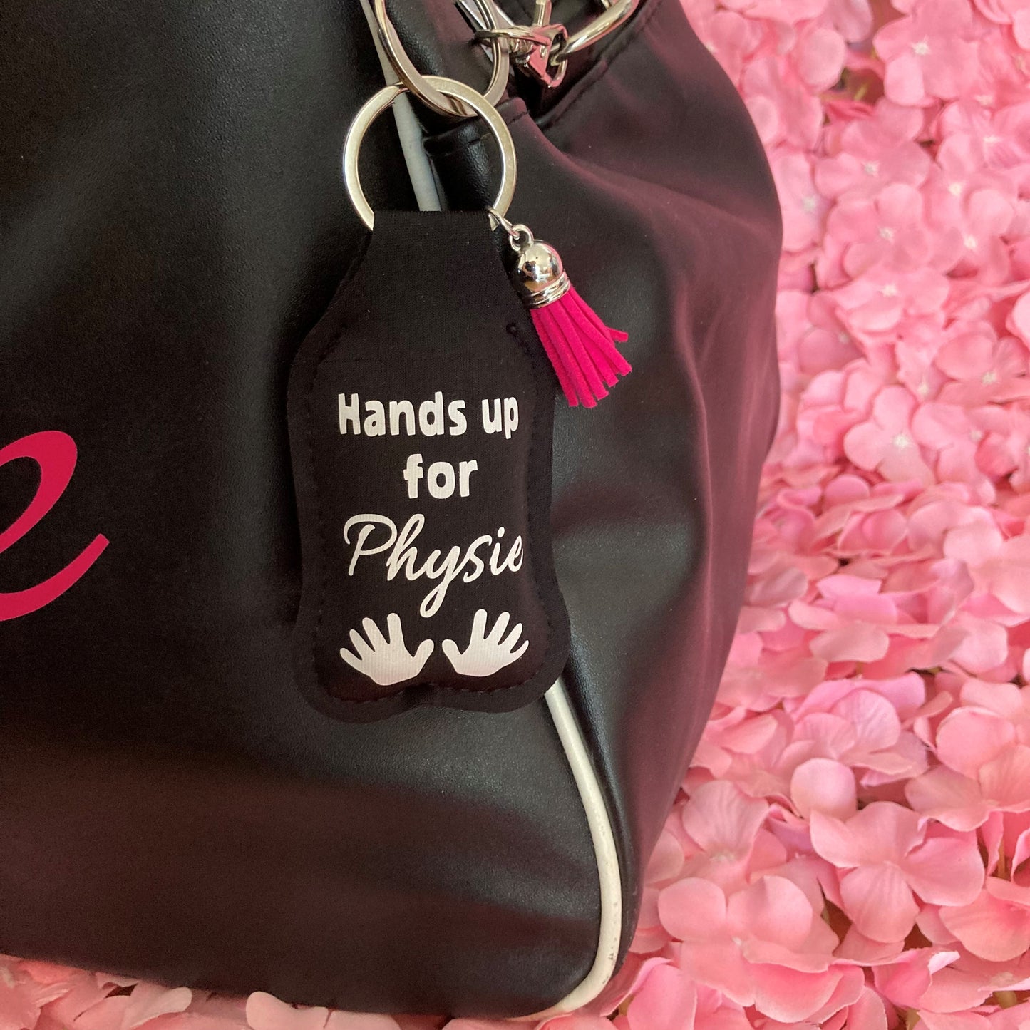 Key ring with hand sanitiser holder