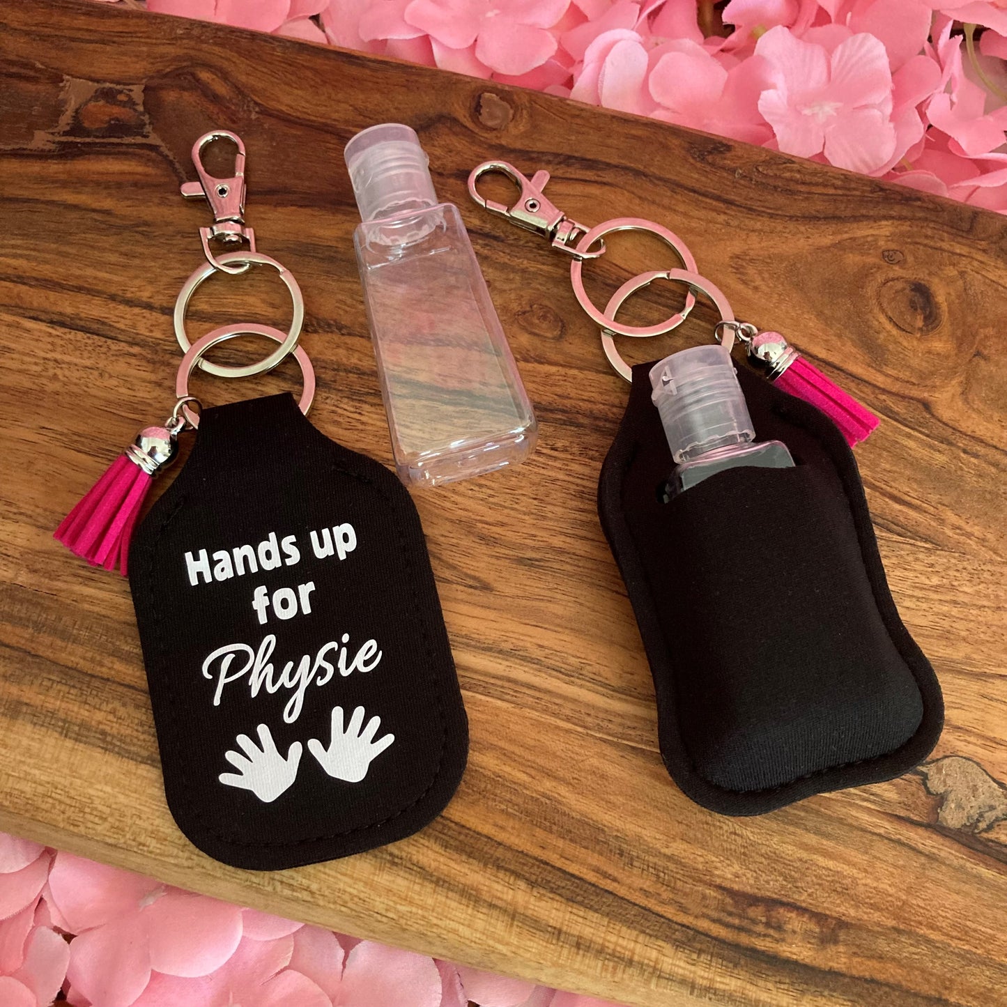Key ring with hand sanitiser holder