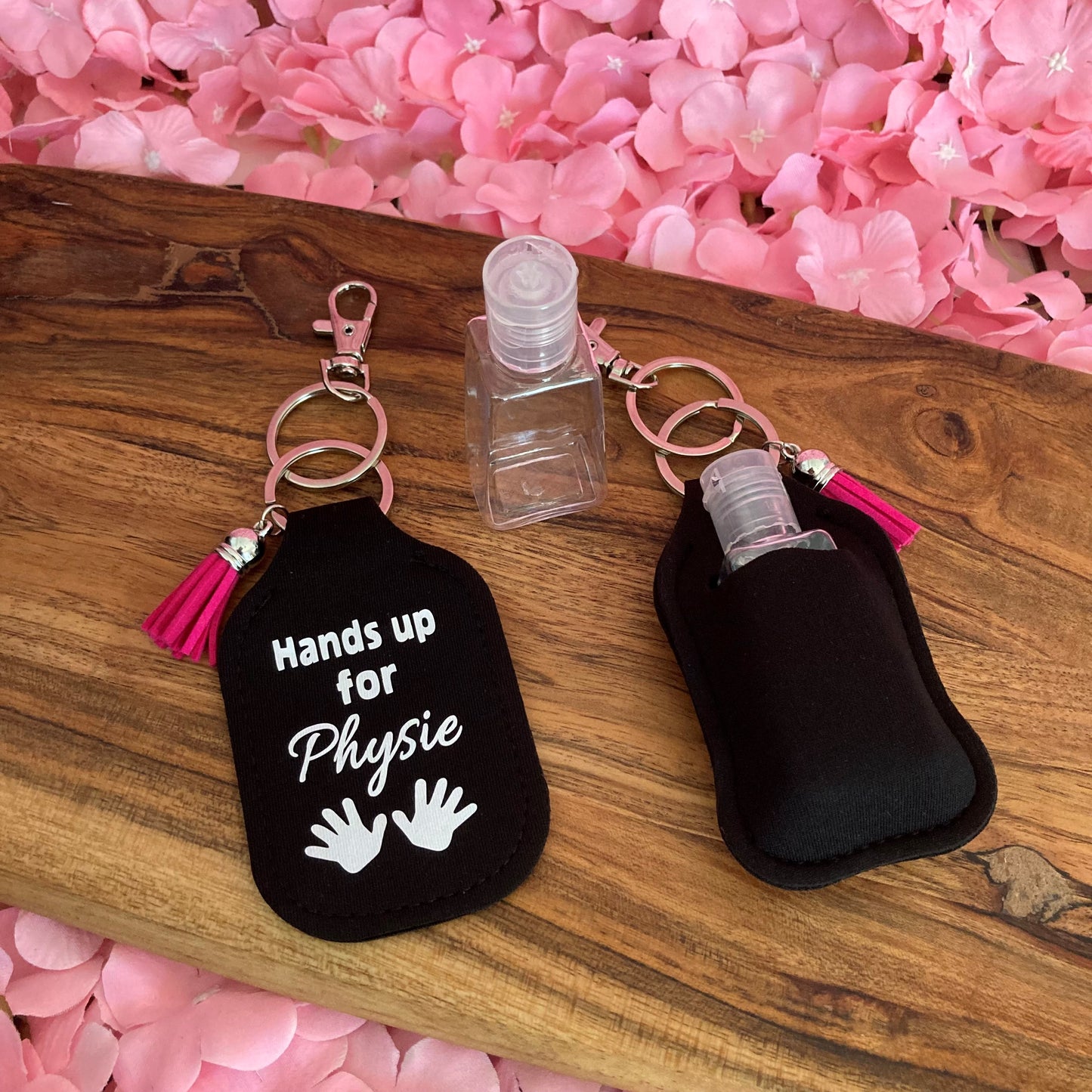 Key ring with hand sanitiser holder
