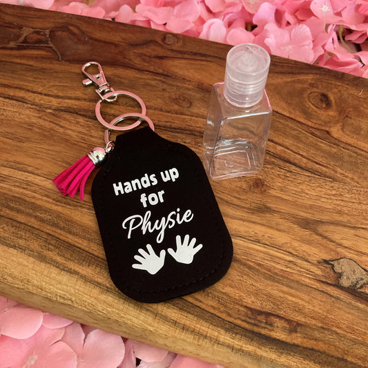 Key ring with hand sanitiser holder